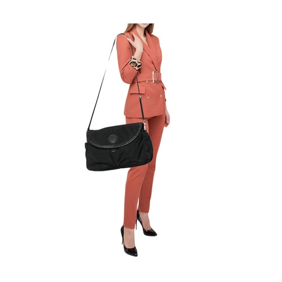 Tory Burch Handbags - Tory Burch
Tory Burch Black Nylon and Leather
Messenger Bag